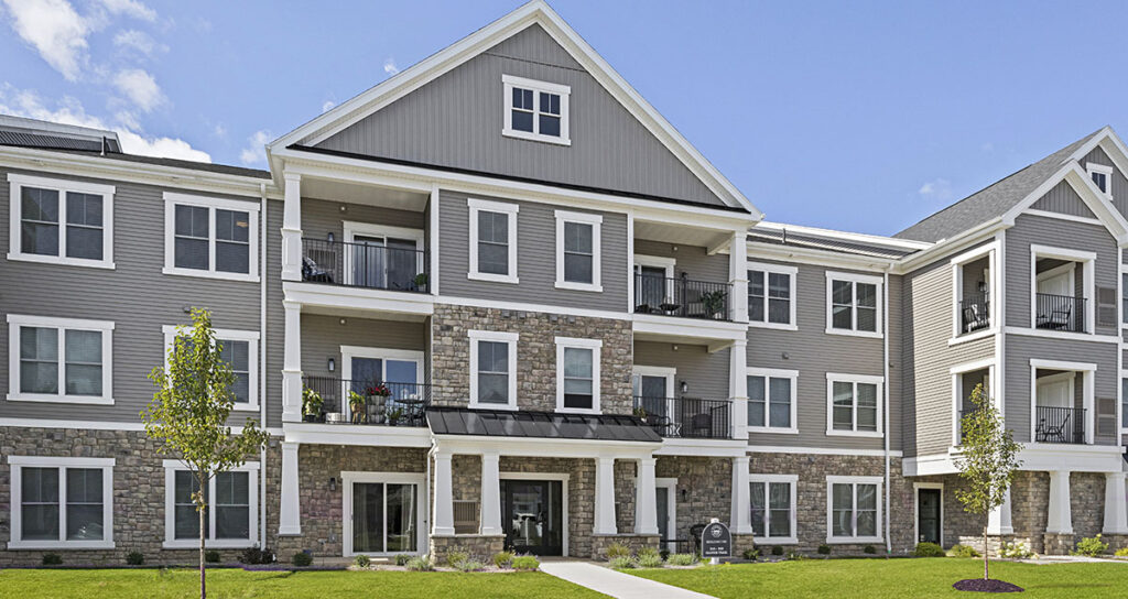 exterior photo of the front of the apartment building at Parker Place